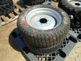 Two Titan LSW 305-521 NHS Tires and 6-Lug Wheels