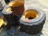 Set of Four CAT Brand Skid Steer Tires and Wheels