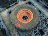 One 8.25-15 Tire and 8-Lug Wheel