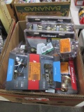 BOX OF BRIGHT BRASS DOOR LOCKS AND HANDLES