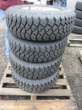 (4) GOODYEAR WORKHORSE LT235/75R15 STUDDED TIRES ON 5 LUG WHEELS