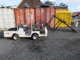 TAYLOR-DUNN MODEL #60-234-48, 48 VOLT ELECTRIC CART W/ ON BOARD CHARGER & RACK, OPERATING CONDITION