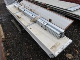 PALLET W/ INTERLOCKING ROOFING, METAL STUDS, GARAGE DOOR PANELS