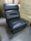 BLACK LEATHAIRE SECTIONAL ARMLESS RECLINER