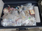 BRIEF CASE CONTAINS MOSTLY COSTUME JEWELRY