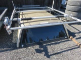 (1) LEER FIBERGLASS TRUCK CANOPY W/A RECREATION INDUSTRIES BOAT LOADER RACK