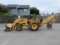 INTERNATIONAL 2504 TRACTOR W/ FRONT LOADER AND BACKHOE ATTACHMENT