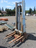 B.C CONVEYING BLUE GIANT WALK-BEHIND ELECTRIC STOCK PICKER W/CHARGER (RUNNING CONDITION UNKNOWN)