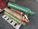 PALLET W/ (3) LARGE OXYGEN TANKS, LARGE ACETYLENE AND A SMALL ACETYLENE TANK AND A LARGE COMPRESSED
