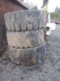 (2) YOKOHAMA Y-545 23.5-25 TIRES AND AN ADVANCE 23.5-25 TIRE