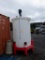 SNYDER INDUSTRIES 500 GALLON VERTICLE POLY TANK, MOUNTED ON 6 LEG STAND, W/LEESON ELECTRIC MOTOR &