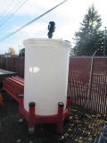 SNYDER INDUSTRIES 500 GALLON VERTICLE POLY TANK MOUNTED ON 6 LEG STAND W/LEESON ELECTRIC MOTOR,