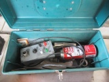 Green plastic tool box of wiring items