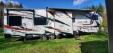 2012 DUTCHMEN VOLTAGE V3905 42' TOY HAULER W/ 3 SLIDE OUTS