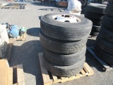 (4) 12R22.5 TIRES ON 10 LUG STEEL HUB WHEELS