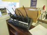 (5) MOTOROLA MTX8250 RADIOS, CHARGING STATION & BOX OF ACCESSORIES