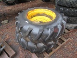 (2) INDUSTRIAL TIRES ON 8 LUG STEEL WHEELS