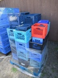 PALLET W/ ASSORTED PLASTIC MILK CRATES