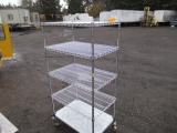 4 SHELF WIRE RACK ON CASTERS *CASTERS DAMAGED