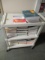 PLASTIC CART W/ASSORTED TEXT BOOKS