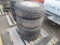 (4) PATHFINDER ATS P245/75R16 TIRES ON 5-LUG WHEELS