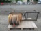 PNEUMATIC HOSE W/ WHEEL, ATTACHED TO RACK