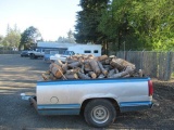 ASSEMBLED PICK UP BED TRAILER CONVERSION FILLED W/ TREE ROUNDS