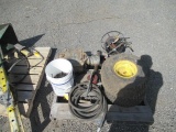 PALLET W/ PROPANE HEATER, (2) LAWN MOWER TIRES, VINTAGE ELECTRIC BELL, MANUAL FUEL PUMP & BUCKET OF