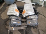 PALLET W/ FORD GRILL & (2) SETS OF FORD HEADLIGHTS