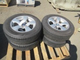 (4) 235/65R17 GOOD YEAR ASSURANCE TIRES ON BMW WHEELS