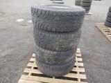 (4) WILD CAT LT315/75R16 TIRES ON 5 LUG WHEELS