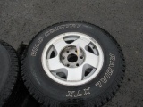 (4) WILD COUNTRY 245/75R16 TIRES ON 6 LUG WHEELS