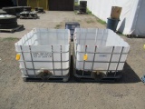 (2) POLY TANKS IN METAL CRATES W/ THE TOPS CUT OFF