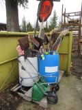 (3) BARRELS OF ASSORTED SHOVELS/BROOMS/SIGNS, POST HOLE DIGGER, RAKE, & FERTILIZER SPREADER