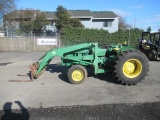 JOHN DEERE 1020 GAS POWERED TRACTOR W/ FRONT END LOADER & FORK ATTACHMENTS