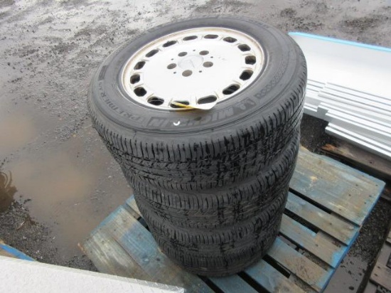 (4) MICHELIN 205/65R15 TIRES ON MERCEDES WHEELS
