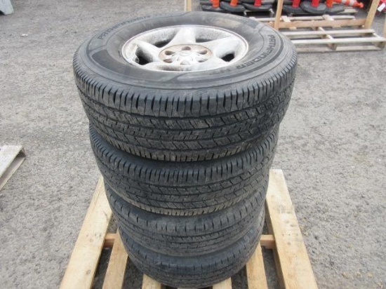(4) PATHFINDER HT 265/70R16 TIRES ON TOYOTA 6 LUG WHEELS