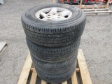 (4) PATHFINDER HT 265/70R16 TIRES ON TOYOTA 6 LUG WHEELS