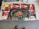 (6) HAND INDUCTION FLYING CARS & (1) POWER RACER SUPER JOYSTICK & POWER GUN GAME