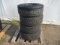 (4) TOYO OPEN COUNTRY 285/65R18 TIRES ON RACELINE 8 LUG ALUMINUM WHEELS