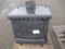 29'' W X 27.5'' D X 32 1/4'' H WOOD BURNING EARTH STOVE