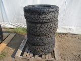 (4) TOYO OPEN COUNTRY 285/65R18 TIRES ON RACELINE 8 LUG ALUMINUM WHEELS