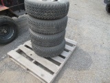 (4) GOODYEAR 235/75R15 TIRES ON 5 LUG ALUMINUM WHEELS
