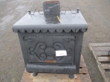 29'' W X 27.5'' D X 32 1/4'' H WOOD BURNING EARTH STOVE