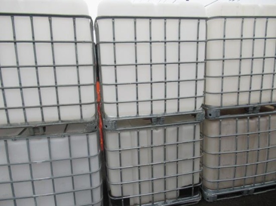 (6) IBC LIQUID STORAGE POLY TANKS W/ METAL BASKETS