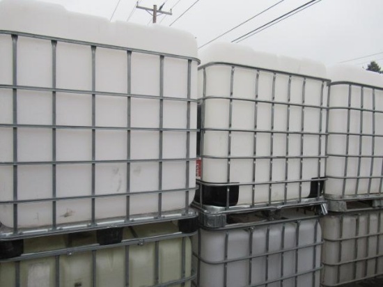 (6) IBC LIQUID STORAGE POLY TANKS W/ METAL BASKETS