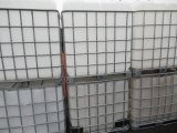 (6) IBC LIQUID STORAGE POLY TANKS W/ METAL BASKETS