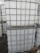 (2) IBC LIQUID STORAGE POLY TANKS W/ METAL BASKETS