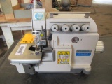 (2) GLOBAL OV514-240 COMMERCIAL SEWING MACHINES & (1) BASE UNIT