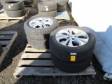(4) STRATUS 215/55R17 TIRES ON KIA WHEELS